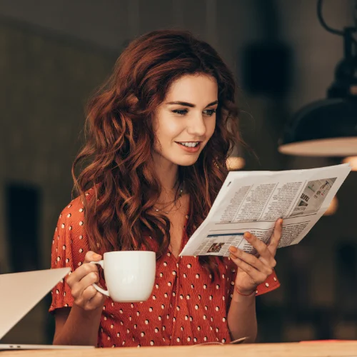 Woman reading a news article