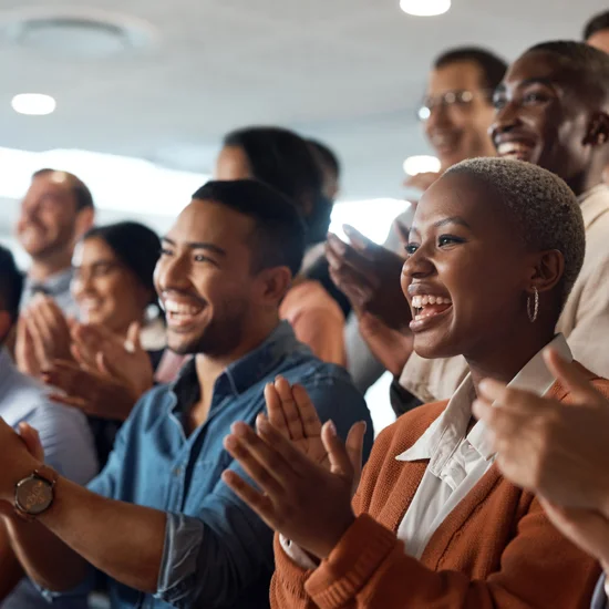 Group of people applauding