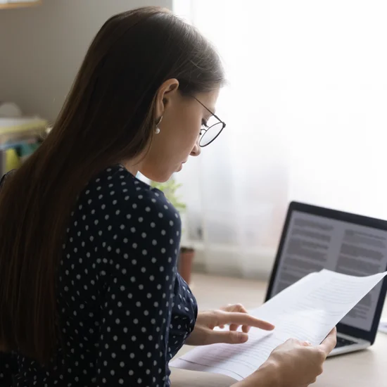 Woman reviewing documents