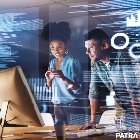 Colleagues in an abstract image reviewing work, data virtually imposed over the image