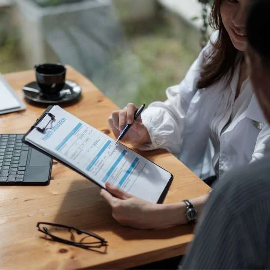 Couple reviewing insurance health forms