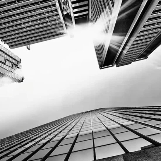 Looking up at the sky between the buildings