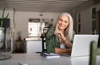 Woman facing outward smiling