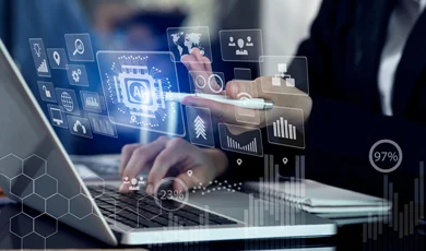 Business woman using tablet and laptop at office with digital interface icons