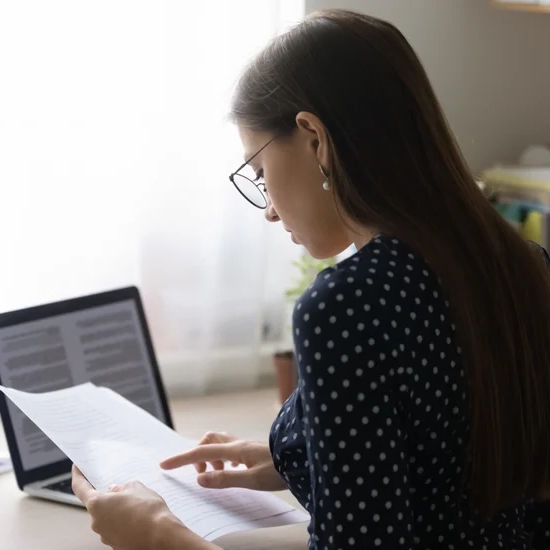 Woman reviewing documents