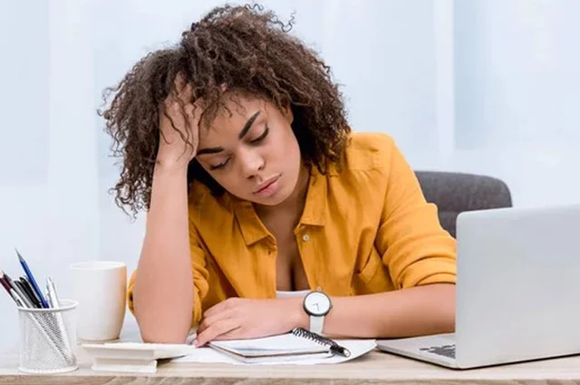 overwhelmed inefficient overworked young woman