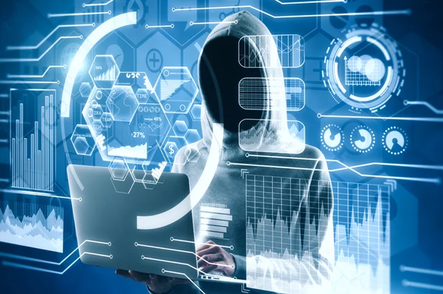 hacker using laptop with interface on blurry background