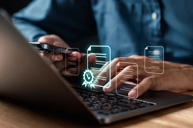 person is using a laptop with digital documents and a certification workflow process