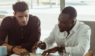 colleagues collaborating on a business plan during a meeting