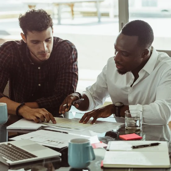 colleagues collaborating on a business plan during a meeting