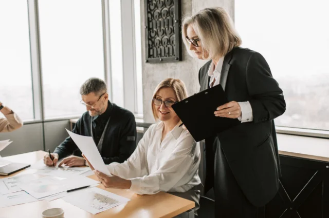 professionals reviewing documents